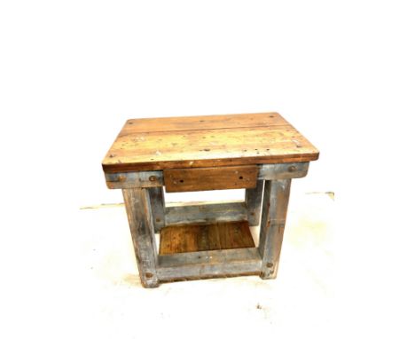 Industrial wooden work bench measures approximately 32 inches tall 36 inches wide 24 inches depth