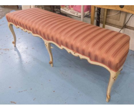 LONG STOOL, 18th century Continental cream painted with red striped upholstery on cabriole supports, 160cm L x 50cm H x 47cm 