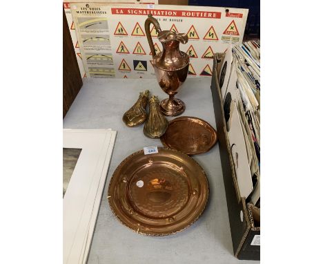 FIVE VINTAGE COPPER ITEMS - TWO POWDER FLASKS, ARTS AND CRAFTS COPPER JUG AND TWO PLATES 