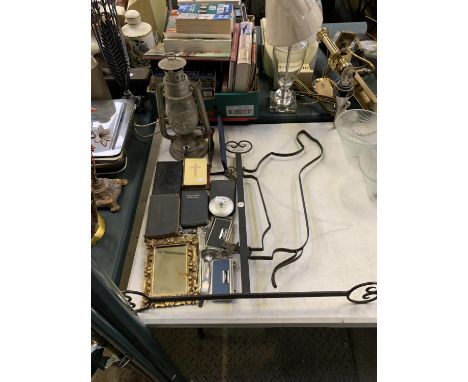 A VINTAGE OIL LAMP, CAST SIGN, BIBLES ETC 