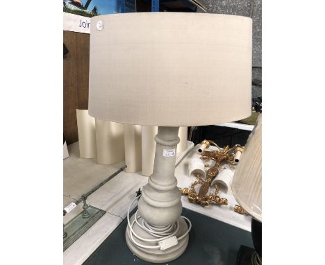 A STONE EFFECT STYLE LAMP BASE AND SHADE 