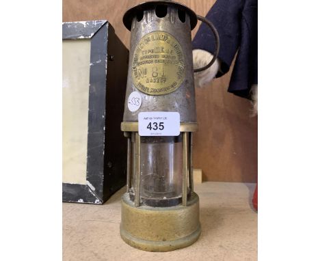 A VINTAGE MANCHESTER OIL LAMP 