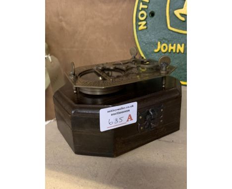 A BOXED BRASS SUNDIAL AND COMPASS COX LONDON 