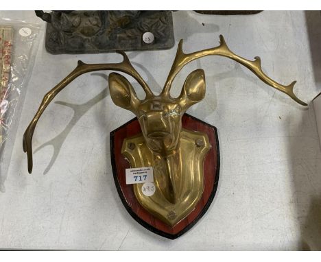 A VINTAGE BRASS MODEL OF A DEER ON WOODEN PLINTH BASE 