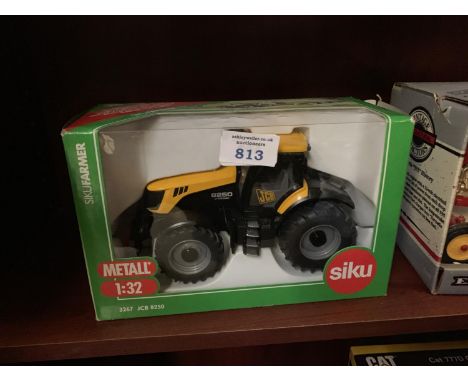 A SIKU JCB 8250 MODEL, 1-32 SCALE,REF NO 3267 BOXED AND IN MINT CONDITION 