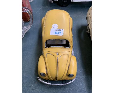 A TIN METAL VW BEETLE MODEL 