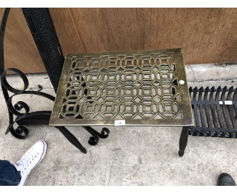 A VINTAGE BRASS TOPPED TRIVET STAND 