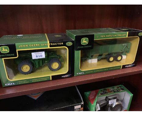 A BRITIANS MODELS JOHN DEERE 8440 TRACTOR AND A BRITAINS 12 TON MARSTON TRAILER, 1-32 SCALE BOTH BOXED AND IN MINT CONDITION 