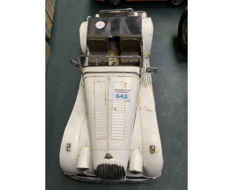 A TIN METAL RACING CAR MODEL 