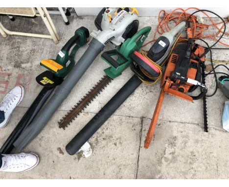 A MIXED LOT OF GARDEN TOOLS - LEAF BLOWER, CHAINSAW, HEDGE TRIMMER ETC 