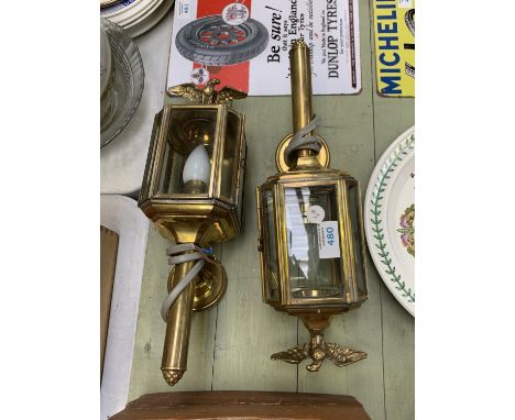 TWO VINTAGE BRASS CARRIAGE LAMPS WITH EAGLE DESIGN TOPS 