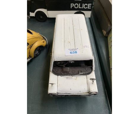 A TIN METAL VAN MODEL 