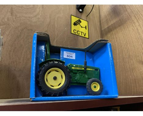 AN ERTL JOHN DEERE COMPACT UTILITY TRACTOR , REF NO 581, 1-16 SCALE, BOXED MODEL AND IN MINT CONDITION 