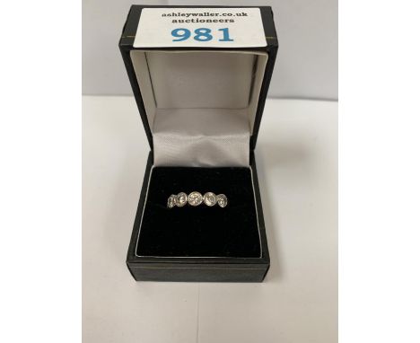 A SILVER SEVEN STONE RING, BOXED 