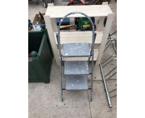 A SET OF FOLDING STEP LADDERS 