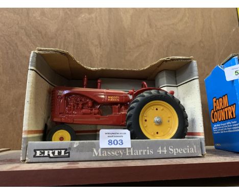 AN ERTL MASSEY HARRIS 44 SPECIAL , REF NO 1115, 1-16 SCALE, BOXED MODEL AND IN MINT CONDITION 