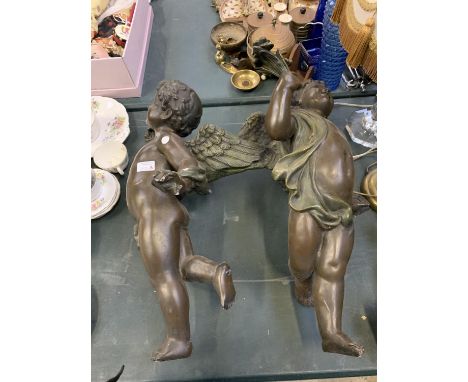 A VINTAGE CHERUB GARDEN FIGURE 