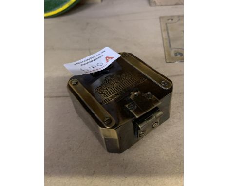 A BRASS KELVIN AND HUGHES COMPASS 