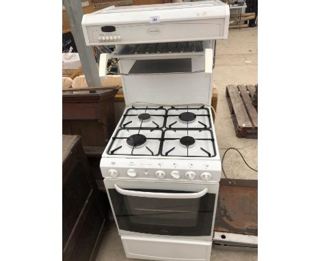 A FOUR RING GAS HOB WITH OVEN IN WORKING ORDER 