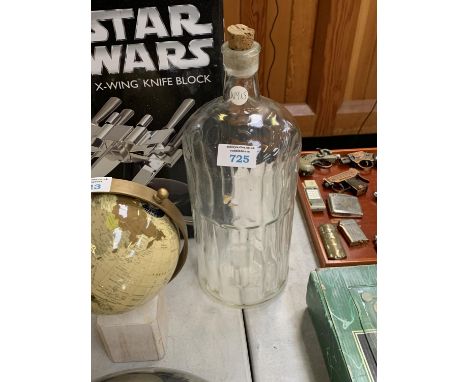 A VINTAGE GLASS 'POISON' BOTTLE WITH STOPPER 