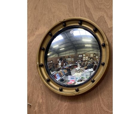 A VINTAGE PORT HOLE MIRROR 