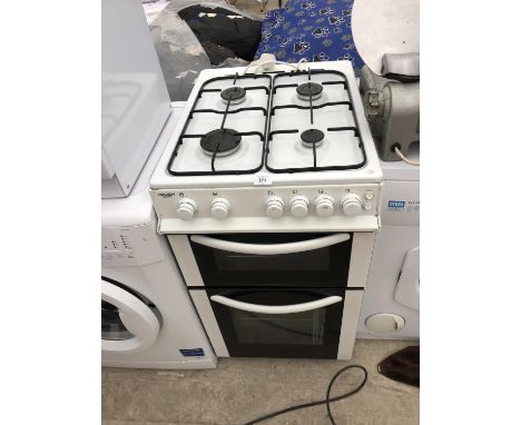 A DOUBLE OVEN AND FOUR GAS RING COOKER IN WORKING ORDER 