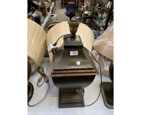 A LARGE TIN STYLE LAMP BASE TOGETHER WITH CREAM SHADE 