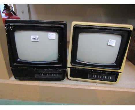 Two vintage Mitsubishi portable televisions