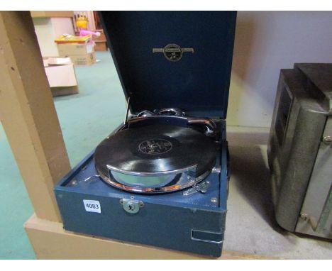 A vintage Columbia wind up gramaphone with disc holding platter