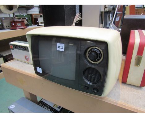 A vintage Sanyo colour television in cream casing