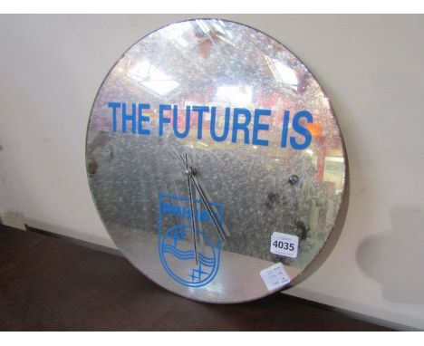 A Philips mirrored glass advertising clock 'The Future is Philips'
