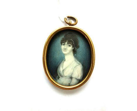 Late 18th century, English School, portrait miniature on ivory of Emily Magenis of Iveagh, wearing a white dress and with a p