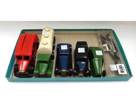 Five Triang Minic tinplate vehicles, comprising; a Minic Dairies tanker, a fire engine, and three vintage cars (a.f) (3).