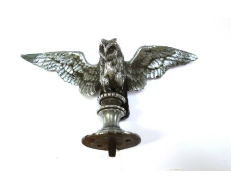 A silvered bronze car mascot, early 20th century, modelled and cast as an owl with outstretched wings, 10cm high.