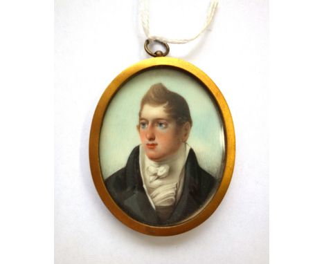 Early 19th century, English School, portrait miniature on ivory of a young gentleman, wearing a black coat and a white high c