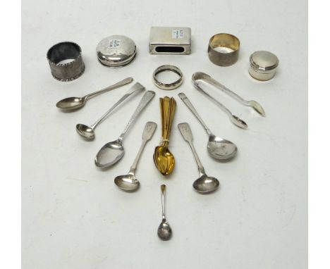 Silver, comprising; a shaped circular box and cover, three napkin rings, a rectangular matchbox slide, a lid, a pair of sugar