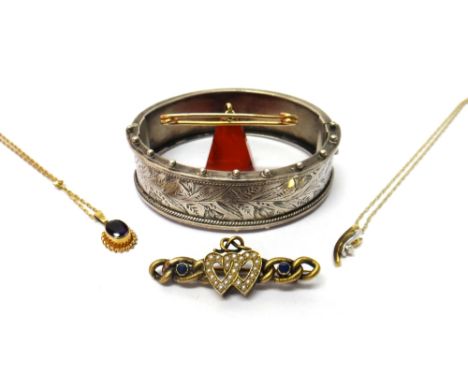 A sapphire and seed pearl set bar brooch, with entwined twin heart shaped motifs, a Victorian silver oval hinged bangle, deco