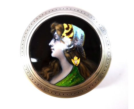 A Limoges style enamel and silver circular patchbox and cover, decorated with a profile portrait of a young lady, 6.5cm diame