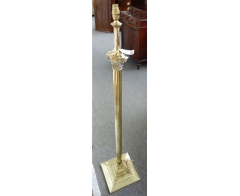 A Victorian brass adjustable standard lamp of corinthian column form.