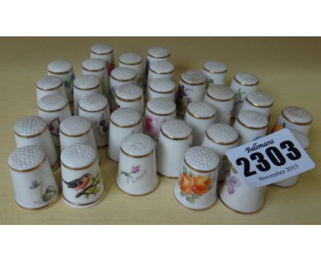 Thirty three Royal Worcester black printed factory mark porcelain thimbles to include work by Anthea Bills, R Homer, Daisy Re