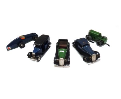 Three Triang Minic clockwork saloon cars, a caterpillar tractor and a racing car (5).