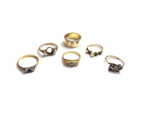 A gold, sapphire and diamond set three stone ring, a gold ring, mounted with three circular opals and with two pairs of small