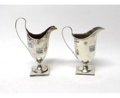 A George III silver helmet shaped cream jug, with engraved decoration and on a square base, London, probably 1790 and a silve