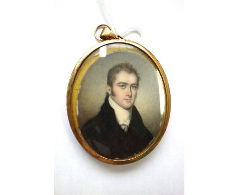 Early 19th century, English School, portrait miniature on ivory of a young man wearing a black coat with a white stock, numbe