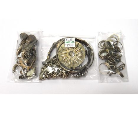Silver and other jewellery, comprising; twenty-five rings, nine pairs of earrings, a circular brooch, with a matching pair of
