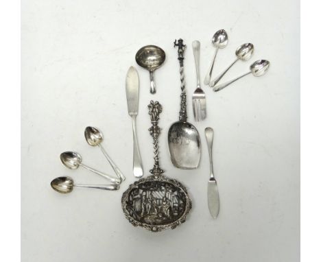 Silver, comprising; a set of six coffee spoons, Sheffield 1913 and a George III tea caddy spoon, possibly London 1794, weight