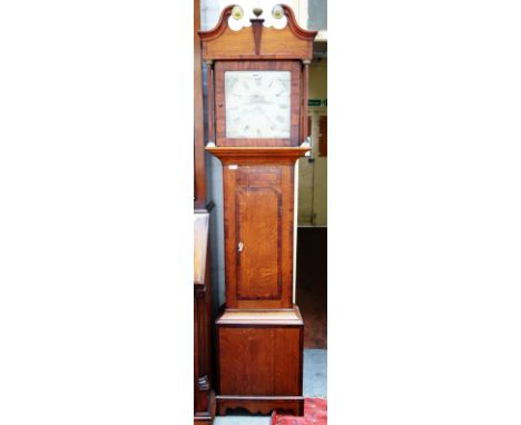 An oak cased thirty day longcase clock, 19th century, with broken arch pediment and pillar supports over a waisted cross-band