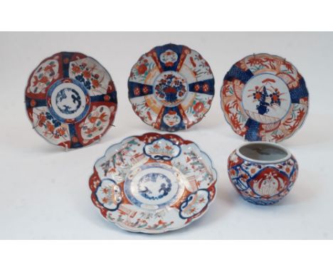 A group of Japanese Imari style porcelain, 20th century, decorated in the blue red and white Imari palette with various desig