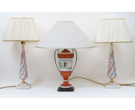 A pair of modern Italian Mangani ceramic table lamps, each with tapering shaft, decorated with trails of flowers and pink int