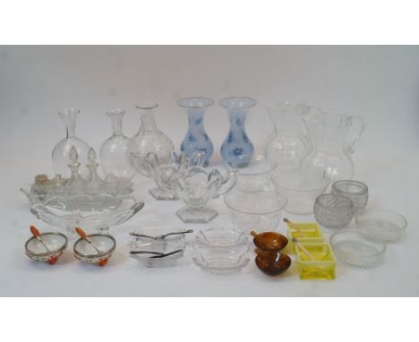 A quantity of glassware, to include: two hand-blown panelled jugs with scrolling S-shape handles, 16cm high; a cut glass five